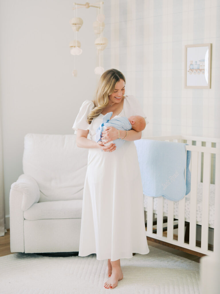 mom holding baby