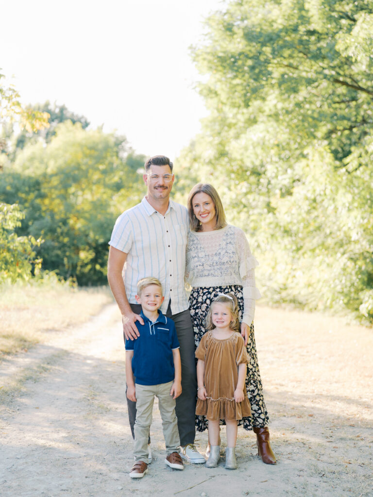 family smiling during spring family session