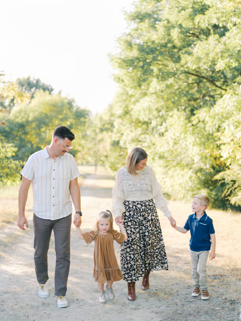 family holding hands and walking together