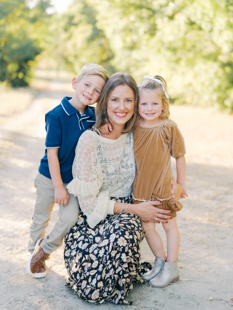 mom and children smiling